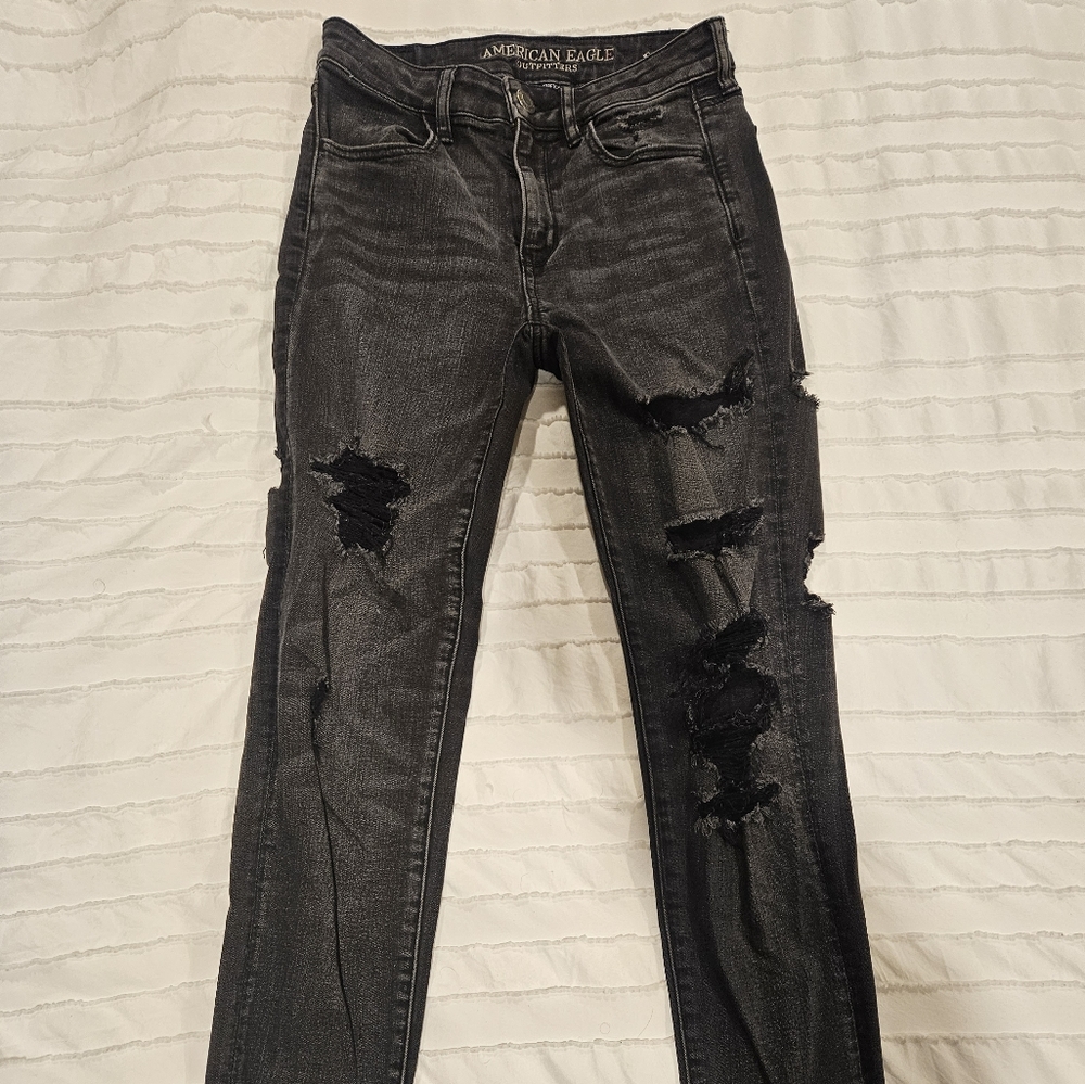 American Eagle size 4 black distressed jean jeggings